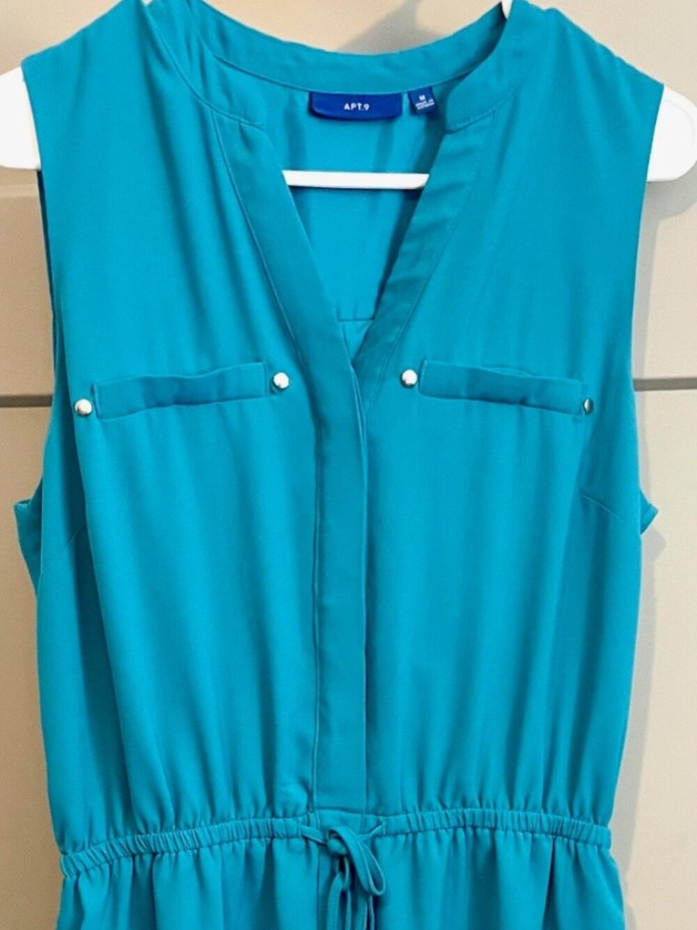 Contemporary style dress with draw string waist & pockets. Lined. Teal blue.